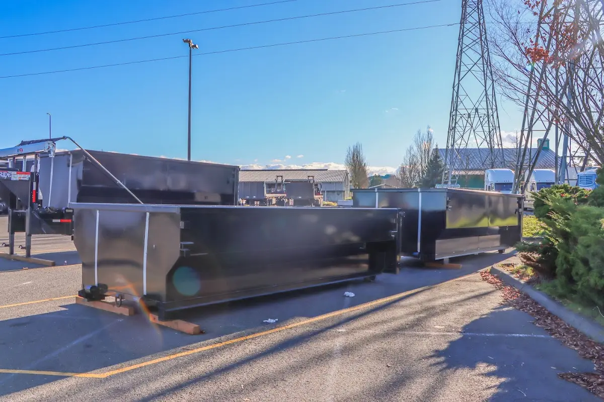 Roll-off dumpster ready for waste disposal at job site for Yard Waste Dumpster Rental in Freeport